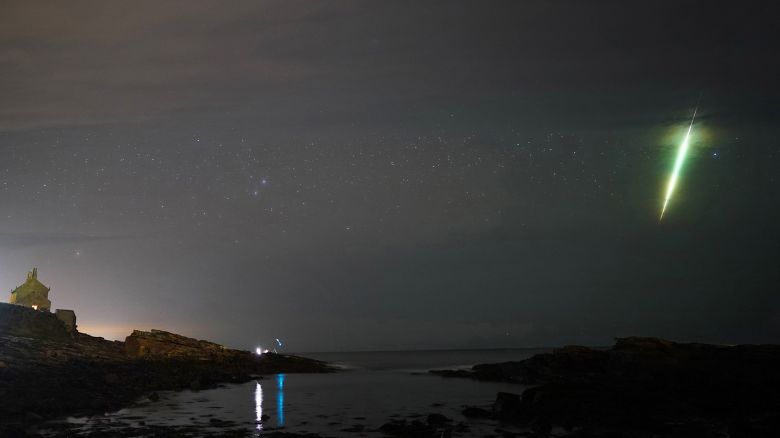 A fisherman watches a meteor during the Draconid meteor shower over Howick rocks in Northumberland. Picture date: Sunday October 10, 2021. (Photo by Owen Humphreys/PA Images via Getty Images)