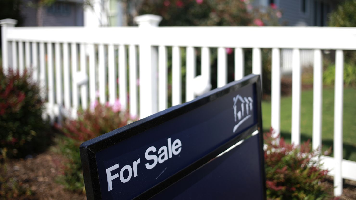 A "For Sale" sign outside a home in Nashville, Tennessee, on Sunday, Oct. 24, 2021.