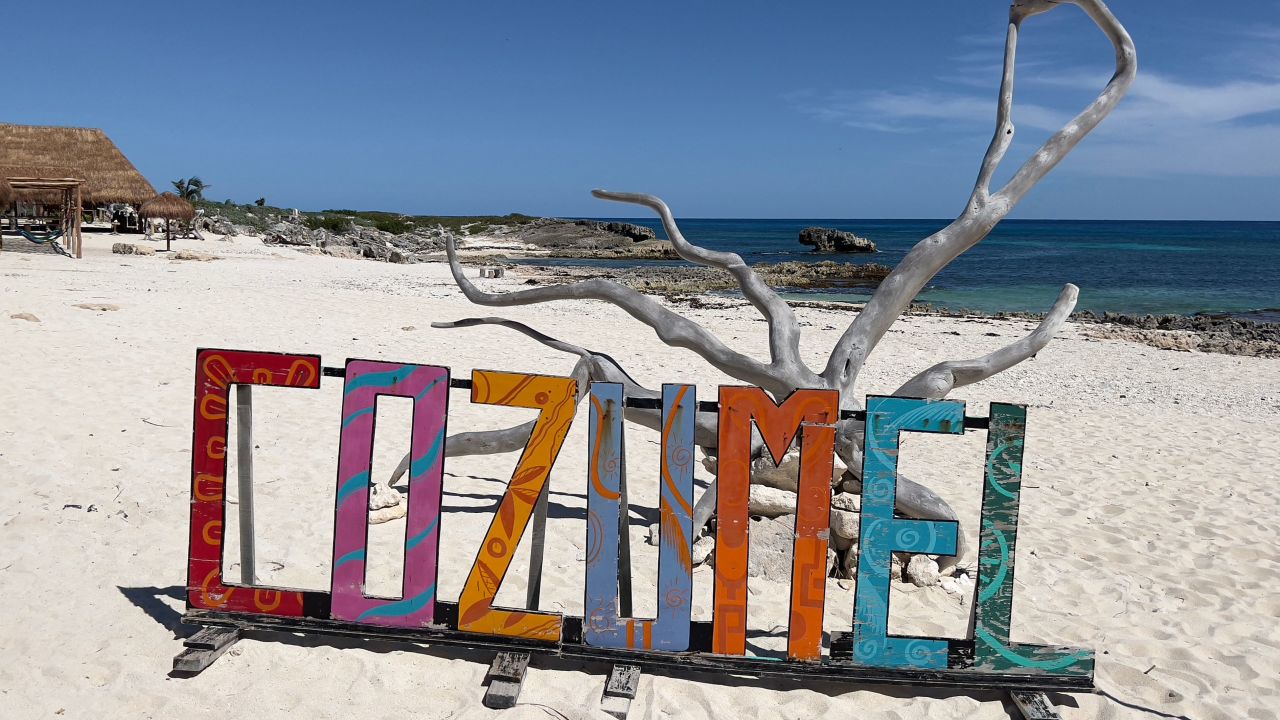 Picture of a sign at a beach in Cozumel island on Mexico's Caribbean coast just off Playa del Carmen in the Mayan Riviera, Quintana Roo State, on October 31, 2021. - Cozumel is usually a major stop on cruise itineraries. Before the pandemic, the cruise industry was Cozumel's main economic activity, with more than 100,000 people dependent on it to some extent, either directly or indirectly, according to officials. (Photo by Daniel SLIM / AFP) (Photo by DANIEL SLIM/AFP via Getty Images)