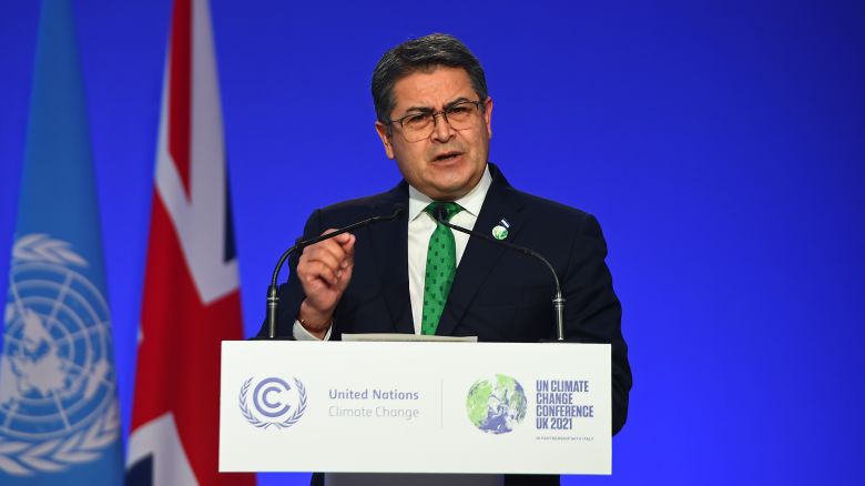 GLASGOW, SCOTLAND - NOVEMBER 01: Honduras President Juan Orlando Hernández presents his national statement during day two of COP26 at SECC on November 1, 2021 in Glasgow, United Kingdom. 2021 sees the 26th United Nations Climate Change Conference. The conference will run from 31 October for two weeks, finishing on 12 November. It was meant to take place in 2020 but was delayed due to the Covid-19 pandemic. (Photo by Andy Buchanan - Pool/Getty Images)