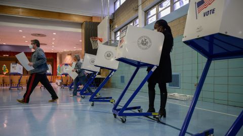 Voters cast their ballots at a voting center in Brooklyn, New York on November 2, 2021. - New Yorkers head to the polls in a mayoral election that is virtually guaranteed to elect Black former policeman Eric Adams as the next leader of America's biggest city. (Photo by Ed JONES / AFP) (Photo by ED JONES/AFP via Getty Images)