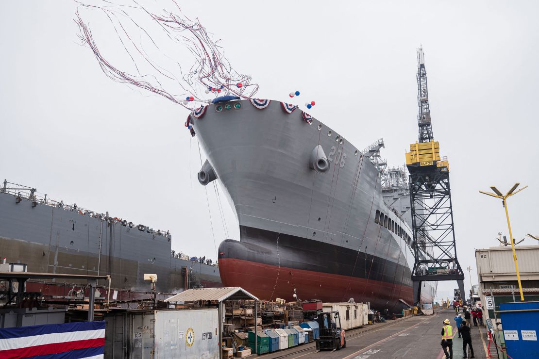 USNS Harvey Milk departs the General Dynamics NASSCO shipyard after a ceremonial address in San Diego, California on November 6, 2021.