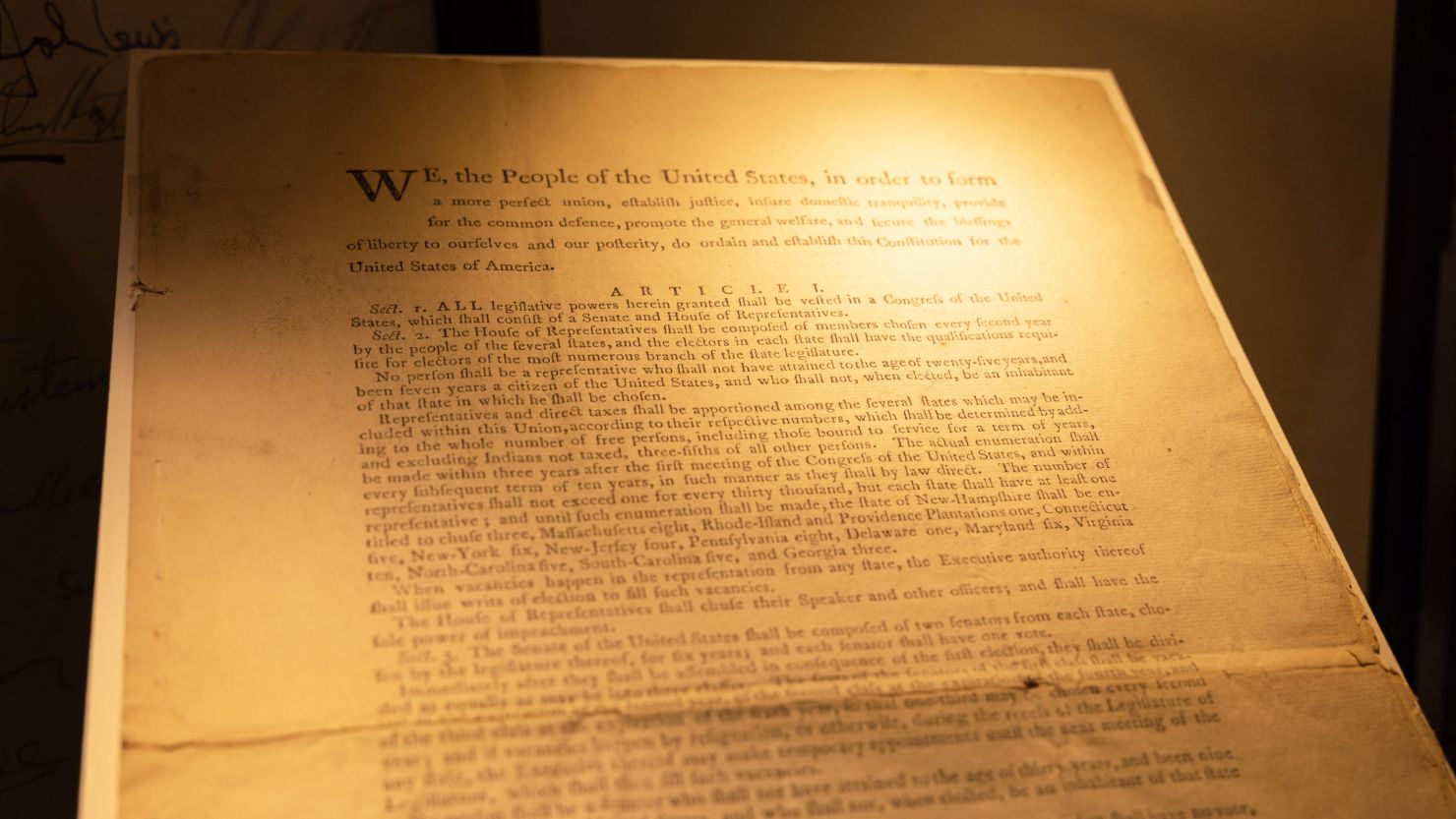 The first printing of the United States Constitution is displayed during an auction at Sotheby's auction house in New York on November 18, 2021.
