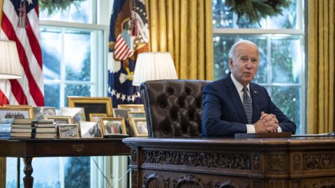 WASHINGTON, DC - DECEMBER 13: U.S. President Joe Biden speaks before g an executive order related to government services in the Oval Office of the White House December 13, 2021 in Washington, DC. The executive order seeks to streamline and modernize a wide array of government services, including claiming retirement benefits, renewing ports, and filing taxes. (Photo by Drew Angerer/Getty Images)