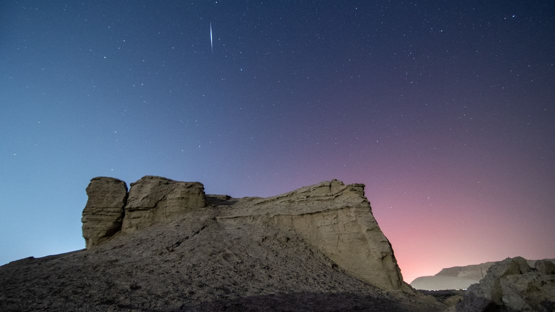 The Quadrantid meteor shower is seen in the night sky over the city of Korla in China's Bayingolin Mongolian Autonomous Prefecture, on January 4, 2022.