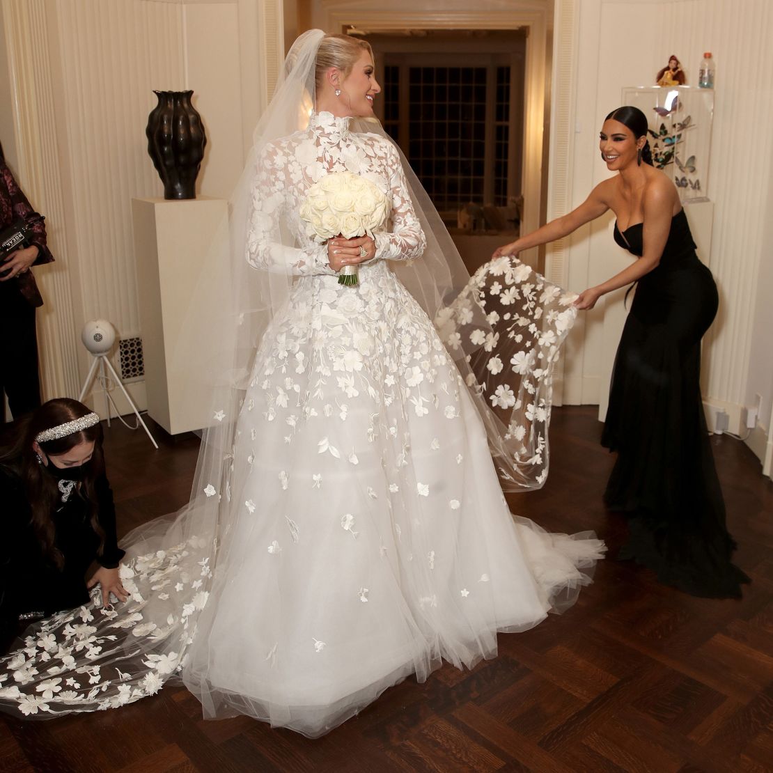 Paris Hilton wore an Oscar de la Renta wedding dress for her ceremony in 2021, complete with a cathedral-length veil.