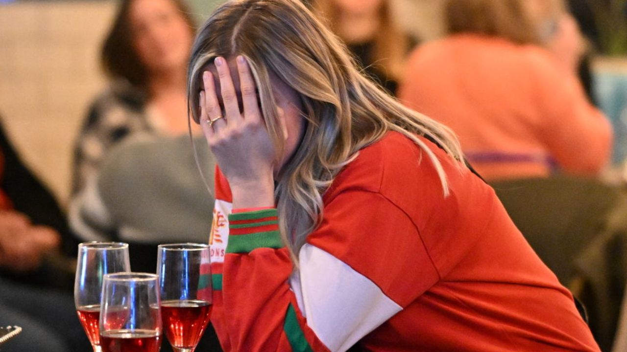 BRISTOL, ENGLAND - FEBRUARY 05: A Wales fan holds her hand to her head during the Scotland v England game at the Bambalan bar on February 5, 2022 in Bristol, England. The 2022 Six Nations Championship will be the 23rd Six Nations Championship, the annual rugby union competition contested by the national teams of England, France, Ireland, Italy, Scotland, and Wales. (Photo by Matthew Horwood/Getty Images)