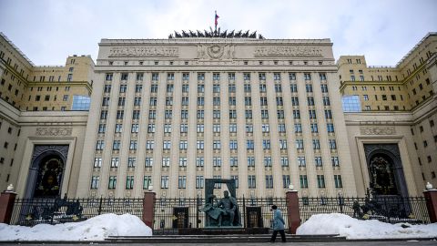 A man walks past the main building of the Russian Defence Ministry in Moscow on February 11, 2022.
