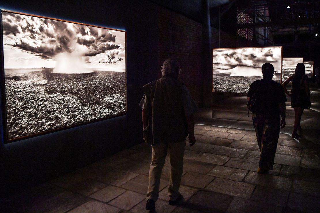 People are seen at Brazilian photographer Sebastiao Salgado's exhibition Amazonia, about deforestation and climate change, at SESC Pompeia in Sao Paulo, Brazil, on February 14, 2022.