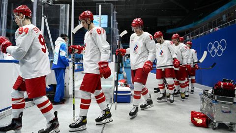 Russian Olympic Committee's players arrive for the men's gold medal match of the Beijing 2022 Winter Olympic Games ice hockey competition between Finland and Russia's Olympic Committee, at the National Indoor Stadium in Beijing on February 20, 2022. (Photo by Kirill KUDRYAVTSEV / AFP) (Photo by KIRILL KUDRYAVTSEV/AFP via Getty Images)