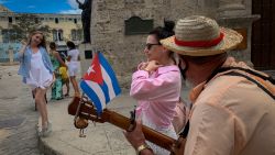 Russian tourists tour the Saint Francisco de Asis Square in Old Havana in Cuba, February 28, 2022. - The EU on Sunday announced swingeing new sanctions against Russia (the country with the highest number of tourists visiting the island), over its invasion of Ukraine, closing its airspace to Russian aircraft. (Photo by ADALBERTO ROQUE / AFP) (Photo by ADALBERTO ROQUE/AFP via Getty Images)