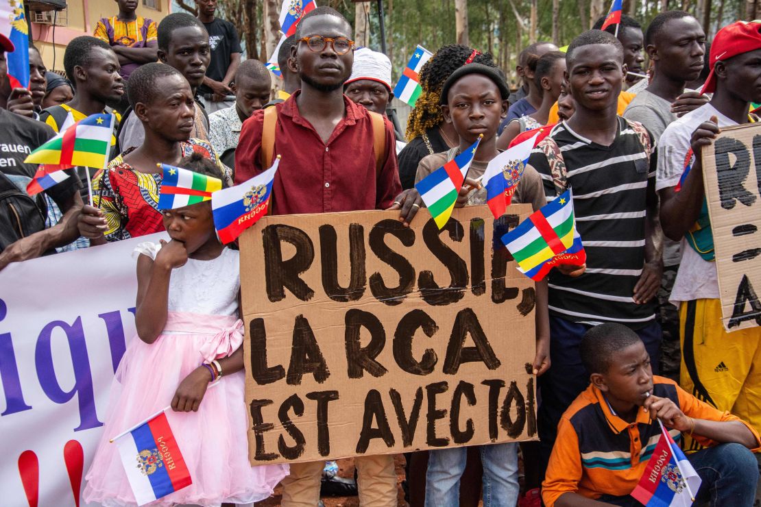 Holding placards with pro russian slogans, demonstrators gather in Bangui on March 5, 2022 during a rally in support of Russia.