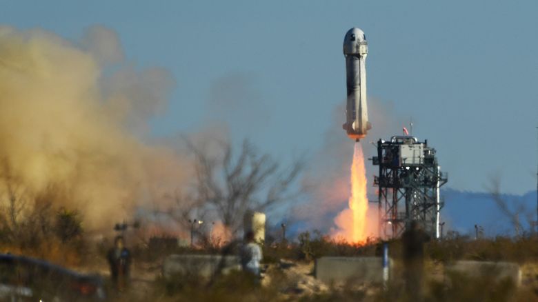 A Blue Origin New Shepard rocket launches from Launch Site One in West Texas north of Van Horn on March 31, 2022. The NS-20 mission carries Blue Origin's New Shepard Chief Architect Gary Lai, Marty Allen, Sharon Hagle, Marc Hagle, Jim Kitchen, and Dr. George Nield into space. (Photo by Patrick T. FALLON / AFP) (Photo by PATRICK T. FALLON/AFP via Getty Images)