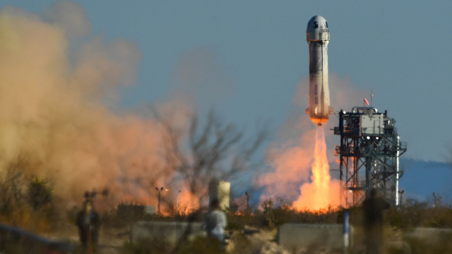 A side view of a Blue Origin New Shepard rocket launching from Launch Site One in West Texas north of Van Horn during a passenger flight on March 31, 2022.