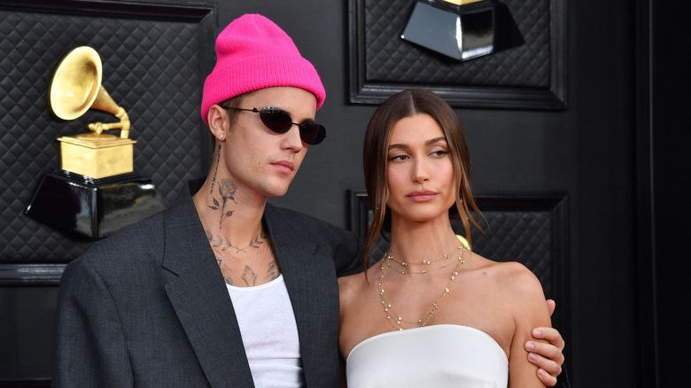 Singer-songwriter Justin Bieber and model Hailey Bieber arrive for the 64th Annual Grammy Awards at the MGM Grand Garden Arena in Las Vegas on April 3, 2022.