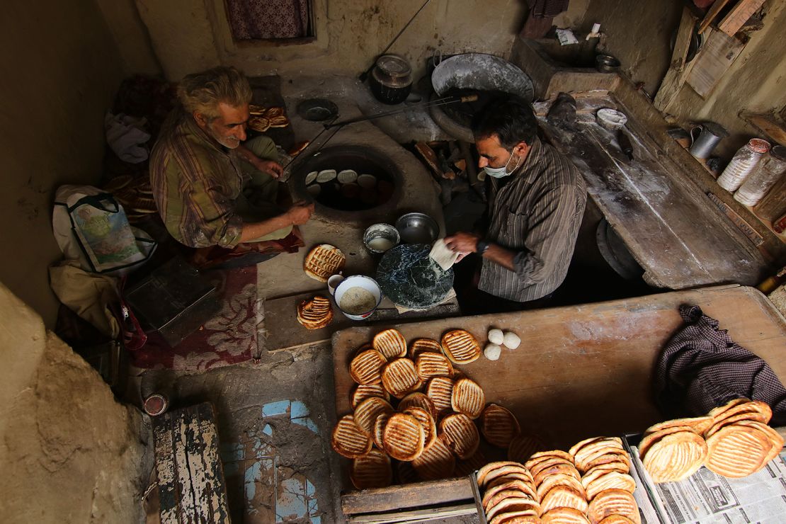 Here, bakers prepare breads that will be eaten at iftar, the fast-breaking meal during Ramadan.