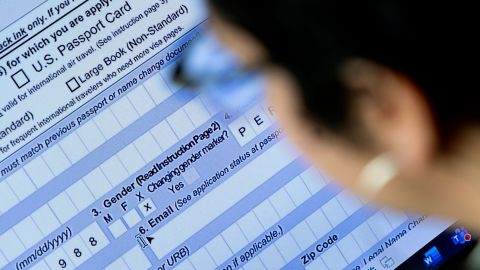 A person begins the process of filling out a passport application with an X gender marker, in April 2022.