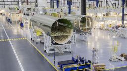 The fuselage of an Airbus A220 at the Airbus Canada LP pre-assembly plant in Mirabel, Quebec, Canada, on Thursday, April 14, 2022. Airbus has added 125,000 square feet of additional space in Mirabel, designed to support the A220 production ramp up capacity, which is expected to more than double in the next few years. Photographer: Graham Hughes/Bloomberg via Getty Images.
