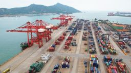 This aerial photo shows cargo containers stacked at a port in Lianyungang in China's eastern Jiangsu province on May 9, 2022.