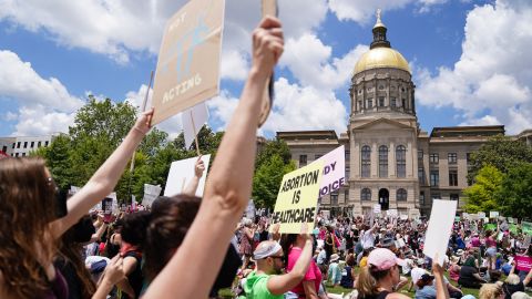 Activists rally outside the State Capitol in support of abortion rights in Atlanta, Georgia on May 14, 2022. - Thousands of activists are participating in a national day of action calling for safe and legal access to abortion. The nationwide demonstrations are a response to leaked draft opinion showing the US Supreme Court's conservative majority is considering overturning Roe v. Wade, the 1973 ruling guaranteeing abortion access. (Photo by Elijah Nouvelage / AFP) (Photo by ELIJAH NOUVELAGE/AFP via Getty Images)