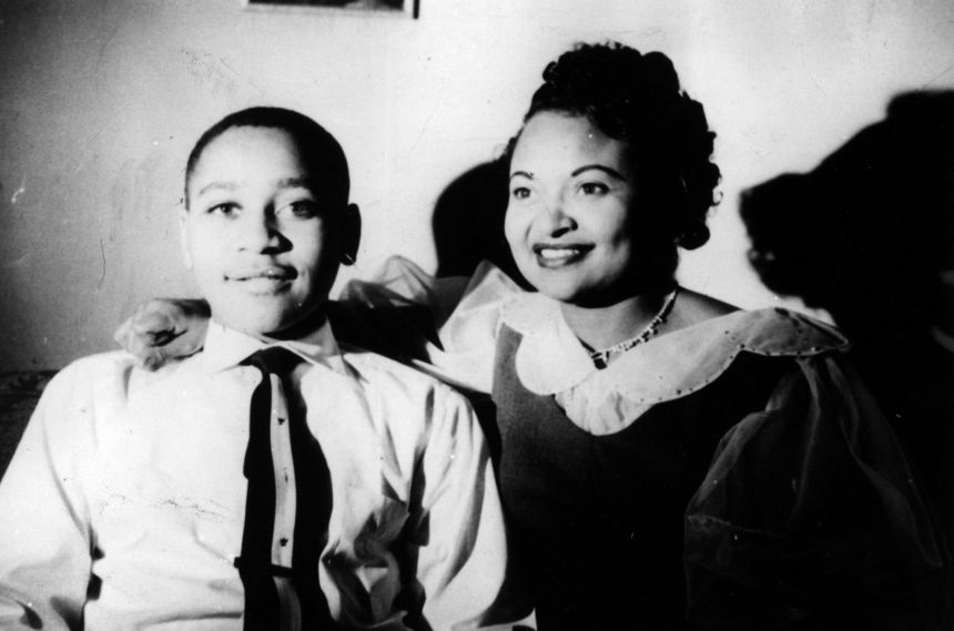 Emmett Louis Till, then 13, is pictured with his mother, Mamie Till-Mobley, at home in Chicago in December 1954.