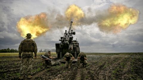 Ukrainian servicemen fire with a French self-propelled 155 mm/52-calibre gun Caesar towards Russian positions at a front line in the eastern Ukrainian region of Donbas on June 15, 2022. - Ukraine pleaded with Western governments on June 15, 2022 to decide quickly on sending heavy weapons to shore up its faltering defences, as Russia said it would evacuate civilians from a frontline chemical plant. (Photo by ARIS MESSINIS / AFP) (Photo by ARIS MESSINIS/AFP via Getty Images)