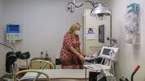 Julie Burkhart, co-owner of the Hope Clinic For Women, looks at an ultrasound machine inside an exam room in Granite City, Illinois, on June 27, 2022. Abortion is now banned in Missouri. Now, the two nearest clinics are in Illinois: Hope Clinic for Women ten miles (16 kilometers) away in Granite City and Planned Parenthood 15 miles away in Fairview Heights, which was opened in 2019 in anticipation of the ban. (Photo by ANGELA WEISS / AFP) (Photo by ANGELA WEISS/AFP via Getty Images)