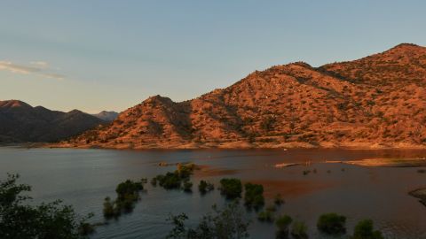 Low water levels at Lake Kaweah, a reservoir formed by the Terminus Dam, in Lemon Cove, California, US, on Saturday, June 25, 2022. By 2032, the US Travel & Tourism sector is expected to make up 9.2% of the entire US economy based on an average annual growth rate of 3.9%  nearly double the anticipated 2% growth rate of the US economy overall, reports the World Travel & Tourism Council. Photographer: Bing Guan/Bloomberg via Getty Images