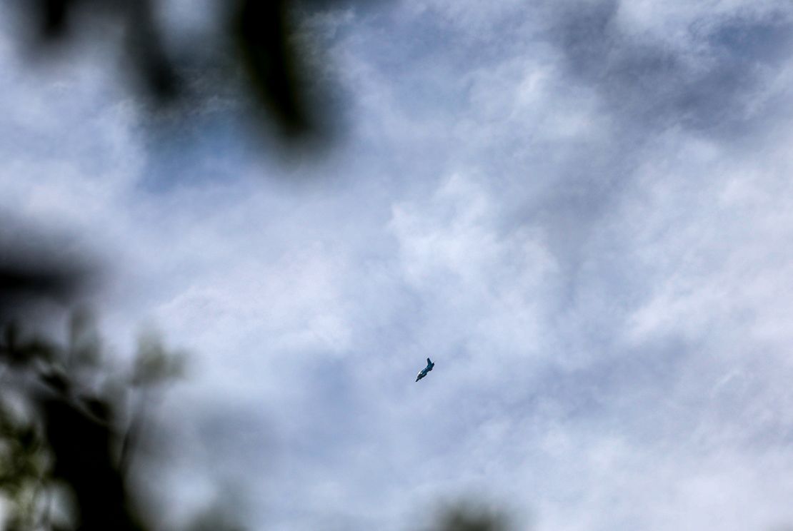 A Myanmar military jet flies overhead after bombing the quarters of Karenni Nationalities Defence Force (KNDF), in Kayah state, Myanmar on July 6, 2022.