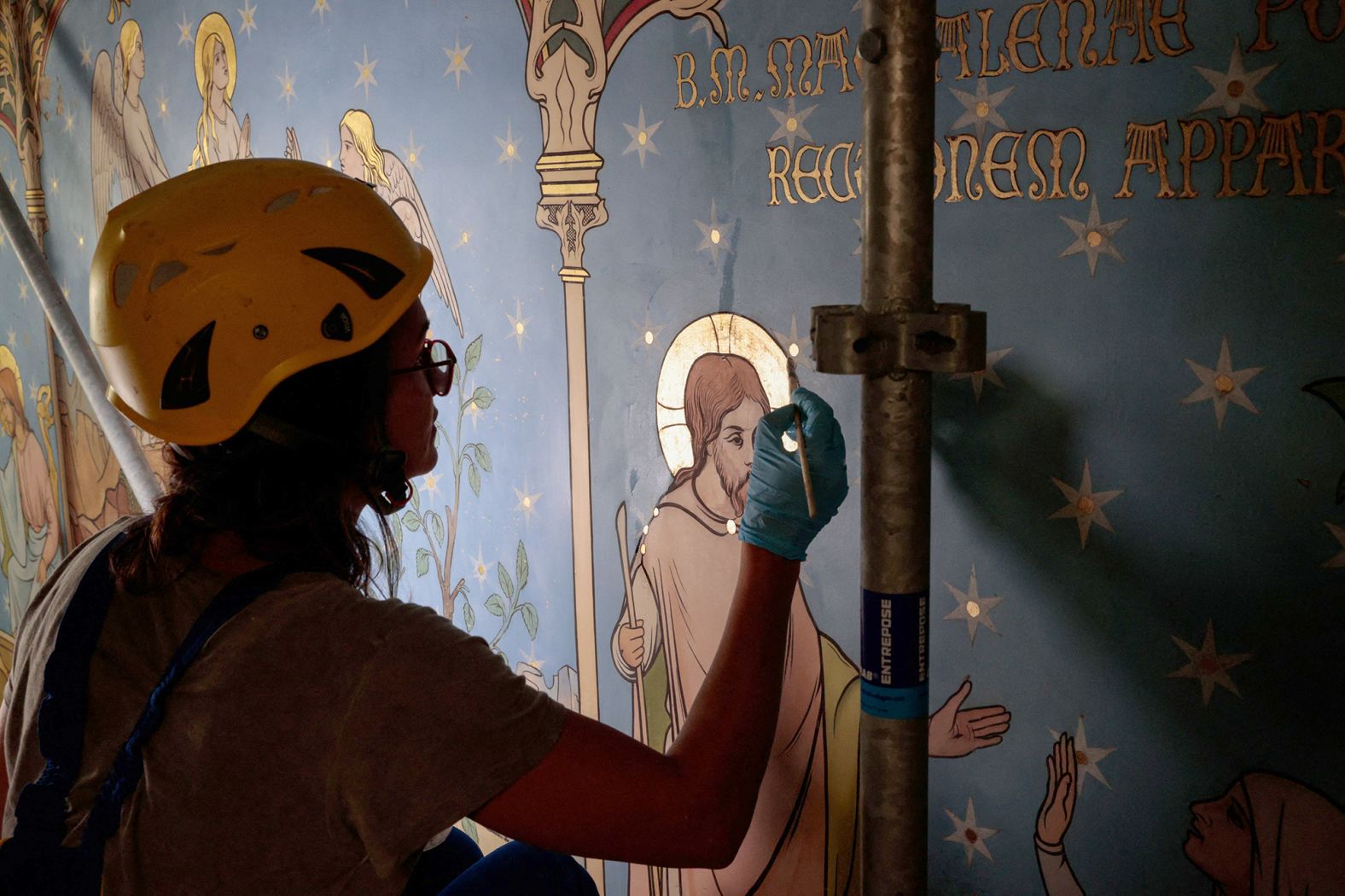 A technician works at the reconstruction site in July 2022.