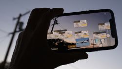 In this illustration photo, the Flightradar24 app shows, via augmented reality, the live position of planes in the area, on a smartphone in Los Angeles, California, on August 5, 2022.