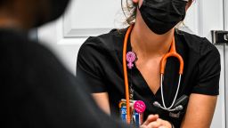 A woman, who chose to remain anonymous, has her vitals checked before receiving an abortion at a Planned Parenthood Abortion Clinic in Jacksonville, Florida on July 20, 2022. Planned Parenthood clinics in Florida have opened their doors on weekends and extended their working hours, with 12-hour days in some clinics, to handle the influx of out-of-state patients, most of them from Georgia, Alabama or Texas. While Florida has reduced its window for abortions to the 15th week of pregnancy -- it was previously the 24th week -- the state's laws are still among the most permissive in the southeast United States. Other Republican-led states in the area -- including Louisiana, Mississippi, Alabama and Georgia -- have almost completely banned the practice or reduced the window to six weeks, seizing on the Supreme Court's stunning reversal of the nationwide right to abortion.