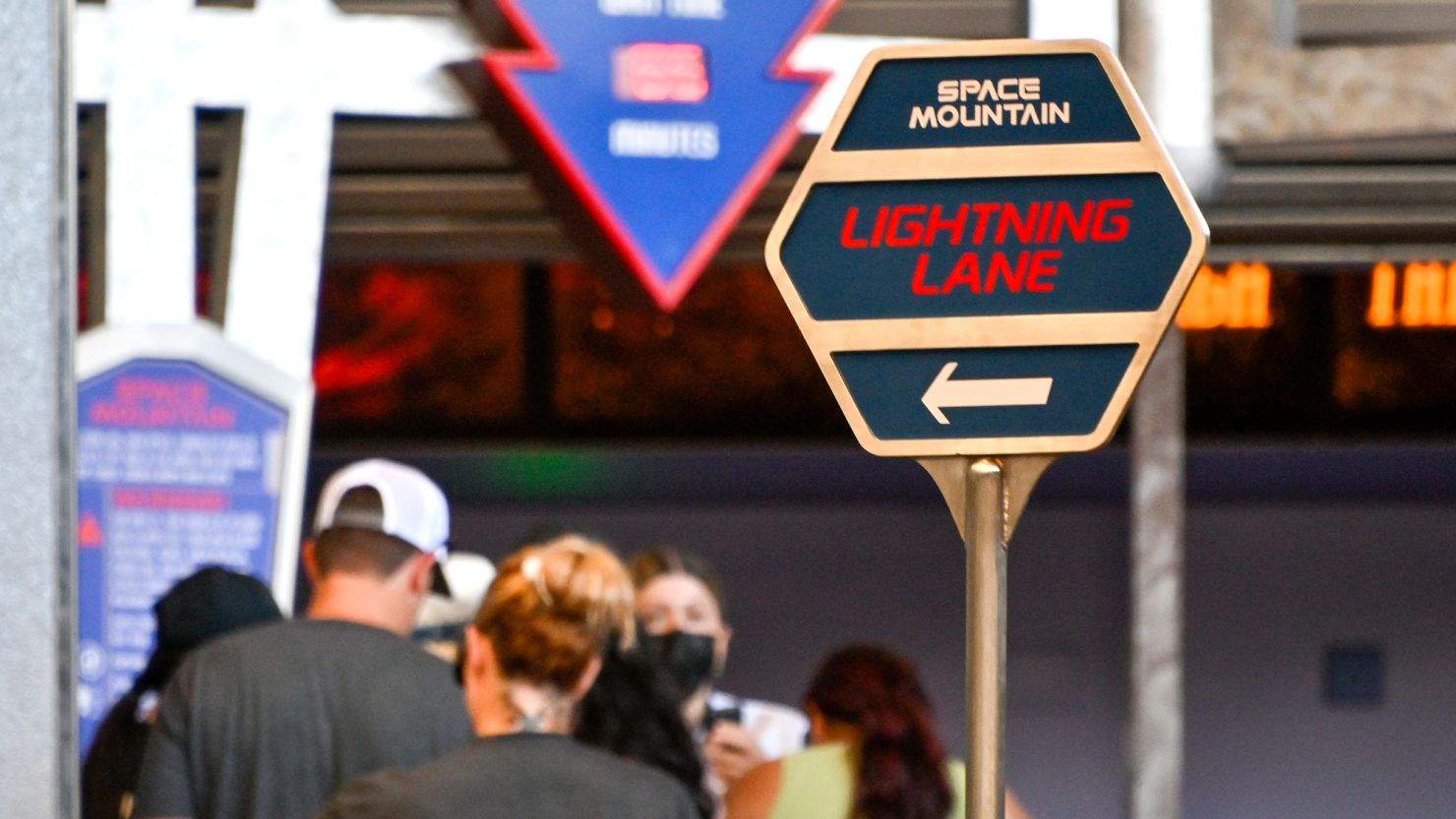 Folks line up in the Lightning Lane at Space Mountain at Disneyland in California in August 2022.