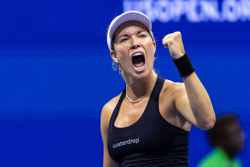 TOPSHOT - USA's Danielle Collins reacts while facing France's Alize Cornet during their 2022 US Open Tennis tournament women's singles third round match at the USTA Billie Jean King National Tennis Center in New York, on September 3, 2022. (Photo by COREY SIPKIN / AFP) (Photo by COREY SIPKIN/AFP via Getty Images)