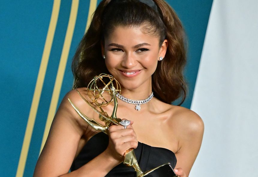 Zendaya poses with the Emmy for outstanding lead actress in drama series for 