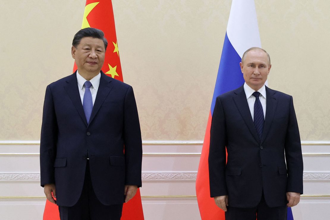 China's President Xi Jinping and Russian President Vladimir Putin pose for a photo on the sidelines of the Shanghai Cooperation Organization leaders' summit in Samarkand in September 2022.