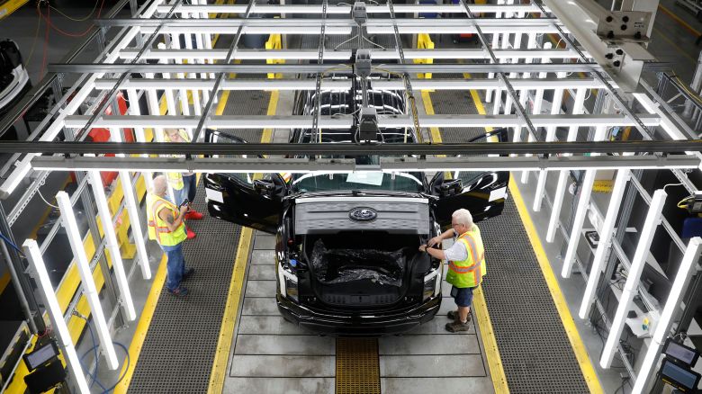 Ford Motor Co. battery powered F-150 Lightning trucks under production at their Rouge Electric Vehicle Center in Dearborn, Michigan on September 20, 2022. (Photo by JEFF KOWALSKY / AFP) (Photo by JEFF KOWALSKY/AFP via Getty Images)