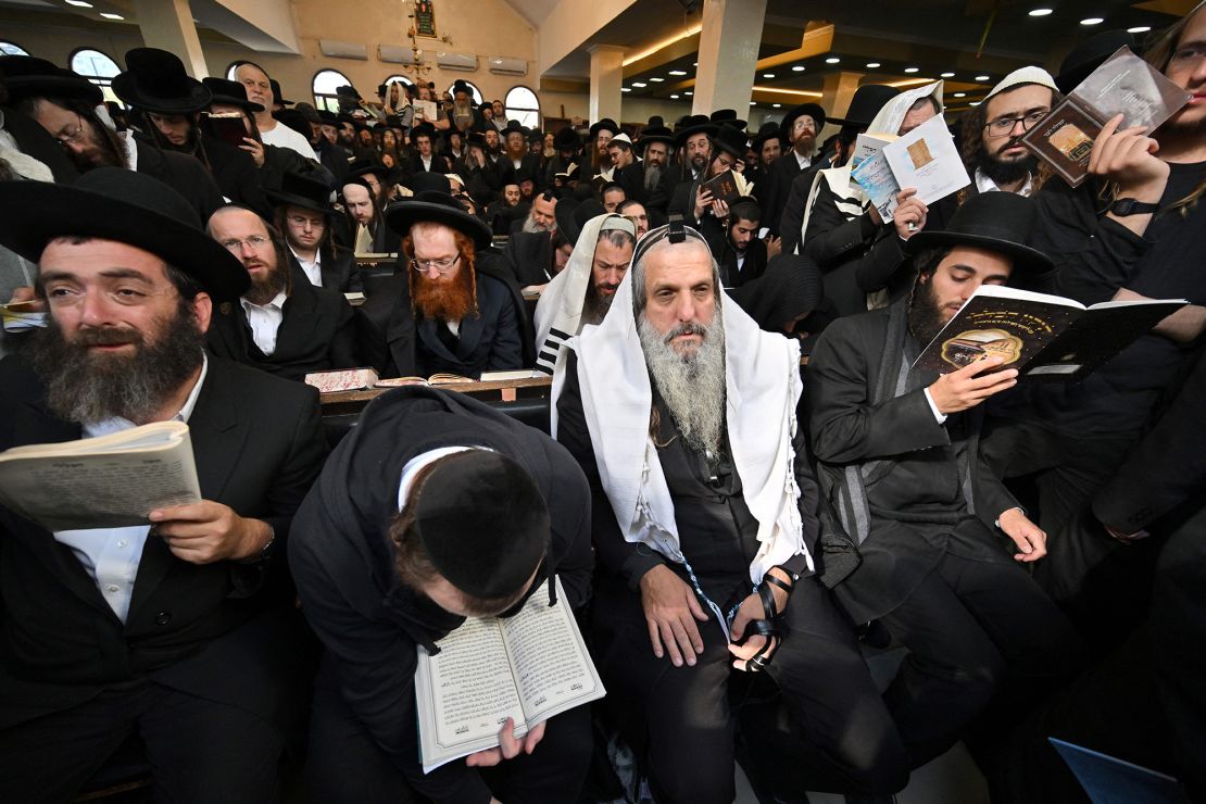 Hasidic Jewish pilgrims pray at the tomb of Rabbi Nachman for Rosh Hashana, the Jewish new year, in the town of Uman, Ukraine, on September 25, 2022.