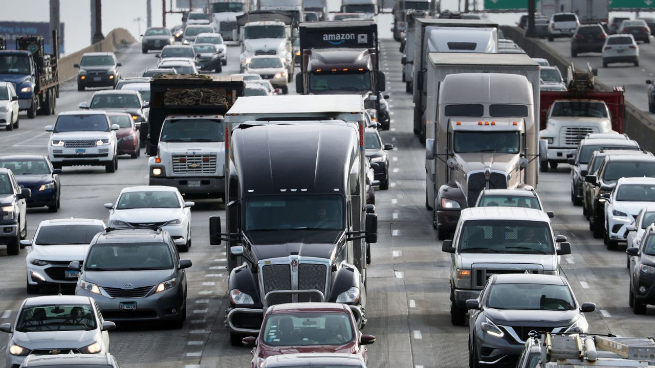 Trucks are stuck in traffic on the inbound Dan Ryan Expressway at Roosevelt Road in Chicago on Jan. 19, 2022.