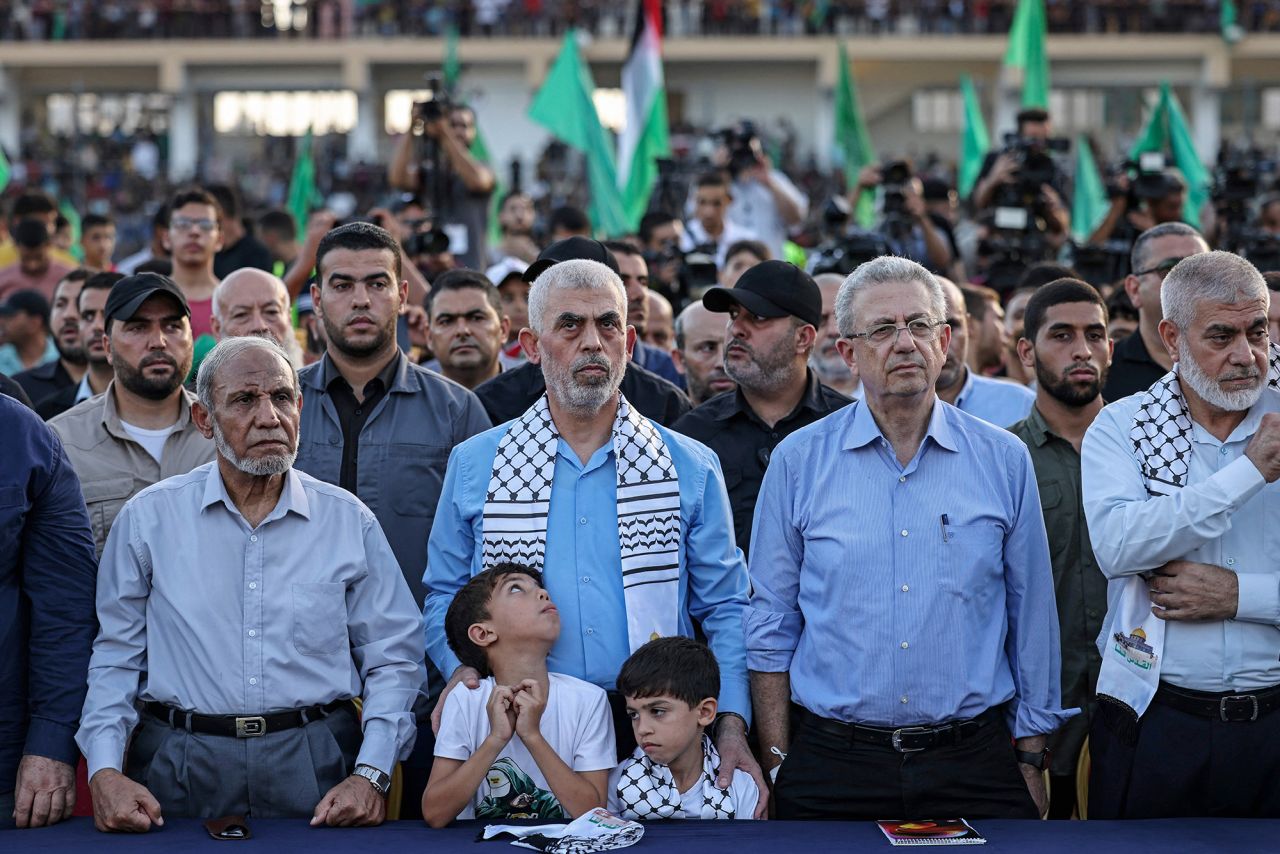 Head of the political wing of the Palestinian Hamas movement Yahya Sinwar, center, and MP, attends a rally in support of Jerusalem's al-Aqsa mosque in Gaza City on October 1, 2022.