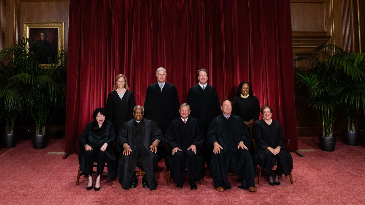 Justices of the US Supreme Court during a formal group photograph at the Supreme Court in Washington, DC, US, on Friday, Oct. 7, 2022. Seated from left: Associate Justice Sonia Sotomayor, Associate Justice Clarence Thomas, Chief Justice John Roberts, Associate Justice Samuel Alito Jr. and Associate Justice Elena Kagan. Standing from left: Associate Justice Amy Coney Barrett, Associate Justice Neil Gorsuch, Associate Justice Brett Kavanaugh and Associate Justice Ketanji Brown Jackson. The court opened its new term Monday with a calendar already full of high-profile clashes, including two cases that could end the use of race in college admissions. Photographer: Eric Lee/Bloomberg via Getty Images