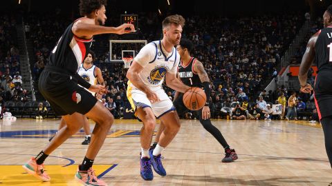 SAN FRANCISCO, CA - OCTOBER 11: Pat Spencer #61 of the Golden State Warriors dribbles the ball against the Portland Trail Blazers during a preseason game on October 11, 2022 at Chase Center in San Francisco, California. NOTE TO USER: User expressly acknowledges and agrees that, by downloading and or using this photograph, user is consenting to the terms and conditions of Getty Images License Agreement. Mandatory Copyright Notice: Copyright 2022 NBAE (Photo by Noah Graham/NBAE via Getty Images)