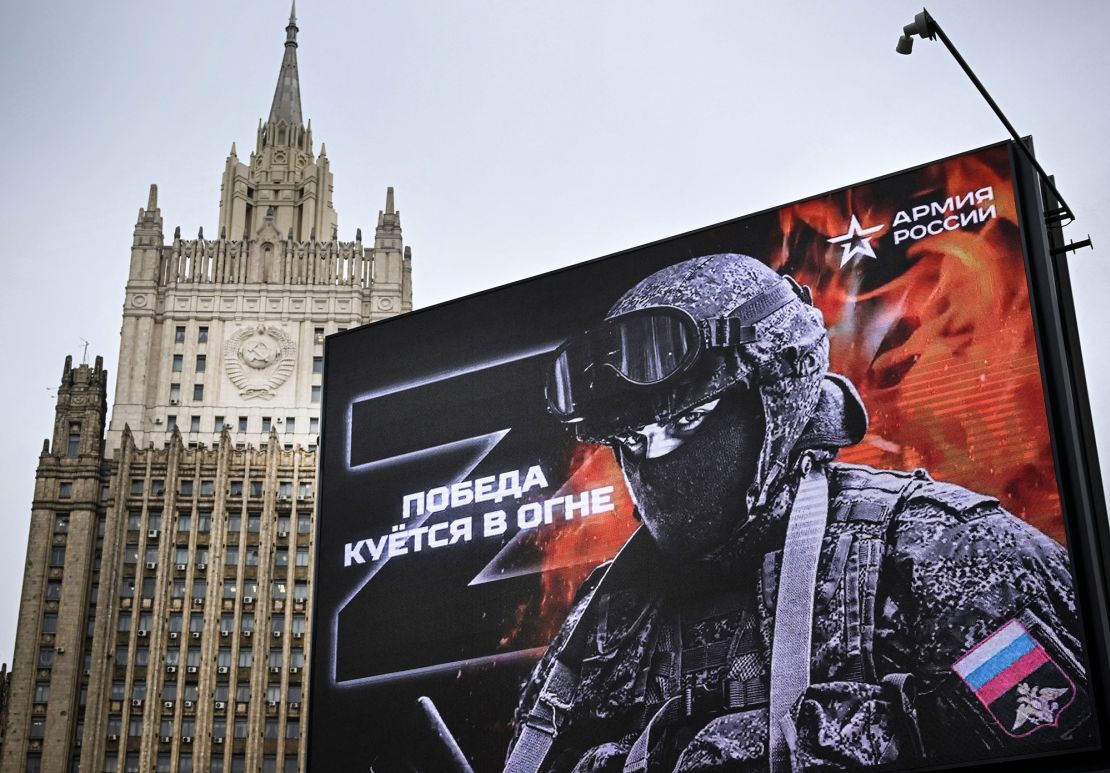 Russian Foreign Ministry building is seen behind a billboard showing Z, a tactical insignia of Russian troops in Ukraine, on October 13, 2022.