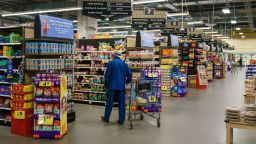 Shoppers walk the aisles of a Kroger supermarket on October 14, 2022, in Atlanta. Most grocery stores under Kroger will be open during their regular hours on July 4.