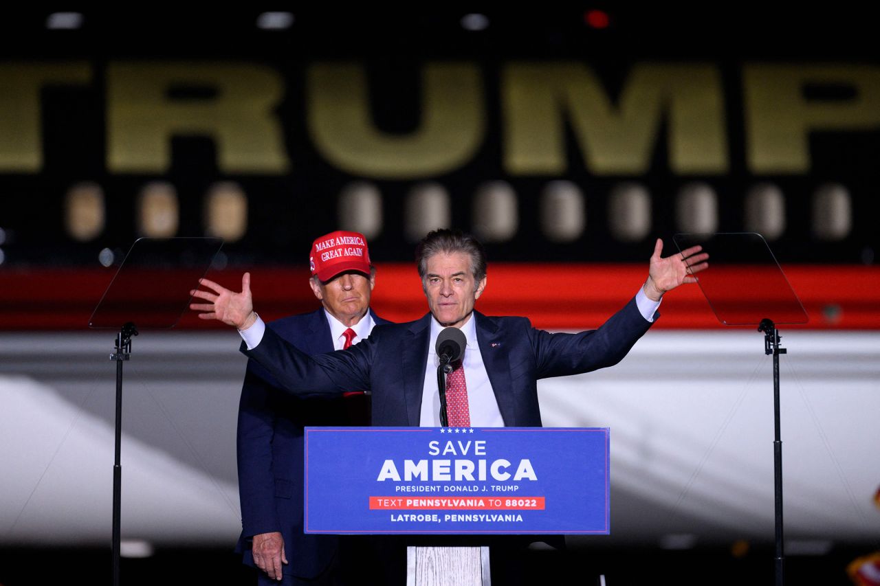 Then-Republican Senate candidate Mehmet Oz speaks alongside Donald Trump during a "Save America" rally ahead of the 2022 midterm elections in Latrobe, Pennsylvania, on November 5, 2022.