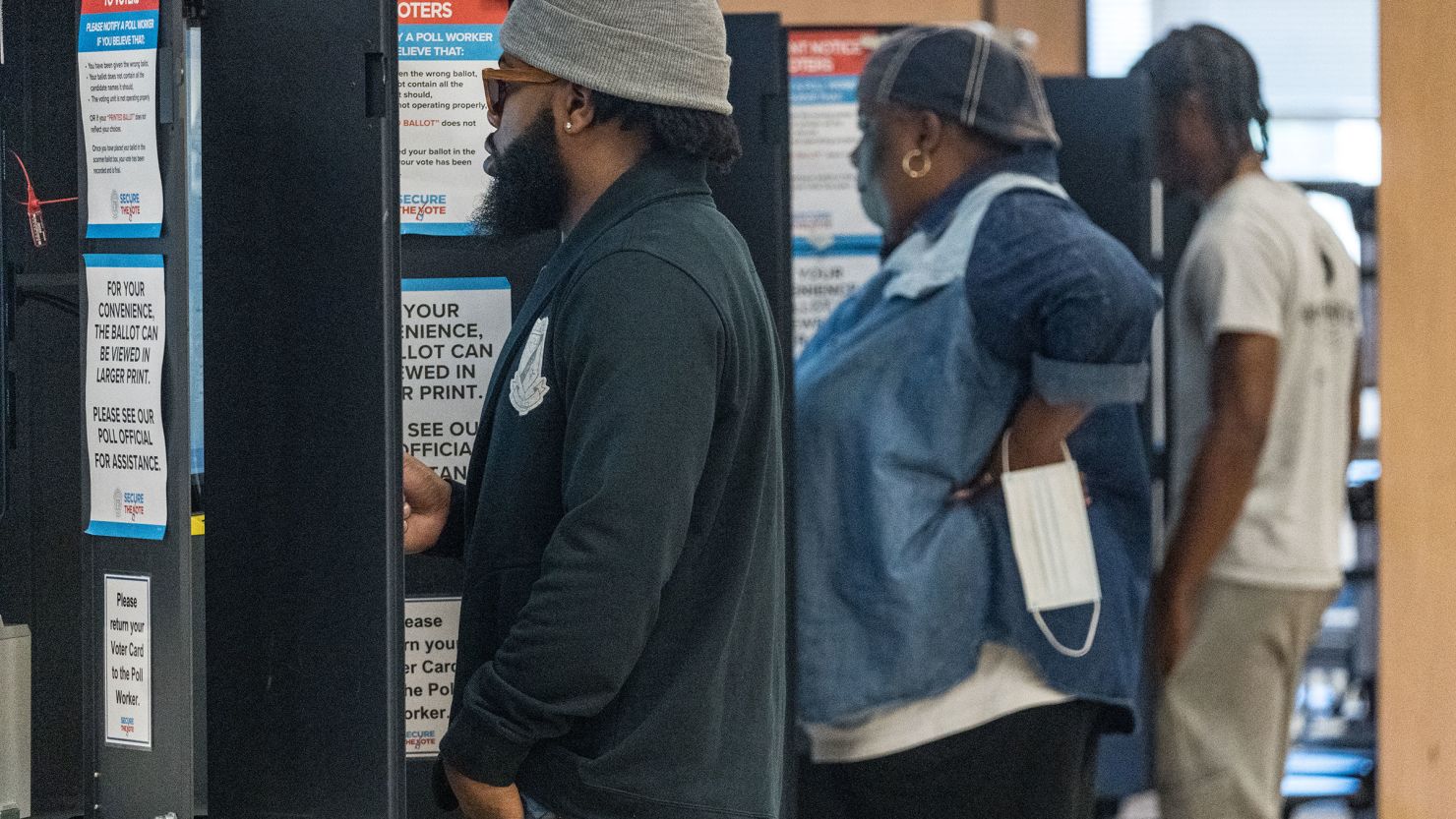 Community members arrive to vote at their local polling location in Atlanta on November 8, 2022.