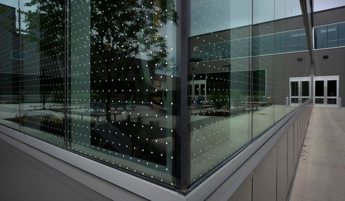 A laminate of dots applied to many of the windows at the L.L. Bean headquarters in Freeport, Maine.