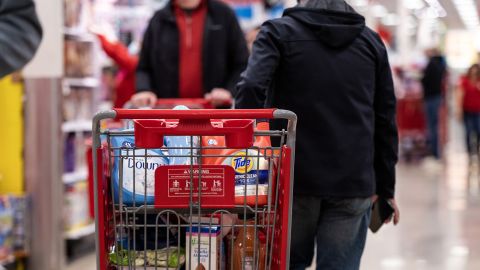 A customer pushes a shopping cart at a Target store on Black Friday in Chicago, Illinois, US, on Friday, Nov. 25, 2022.