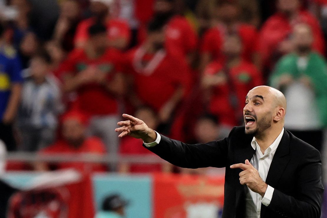 Walid Regragui, head coach of Morocco's national football team, instructs his players from the touchline in Qatar during a FIFA World Cup match in November 2022.