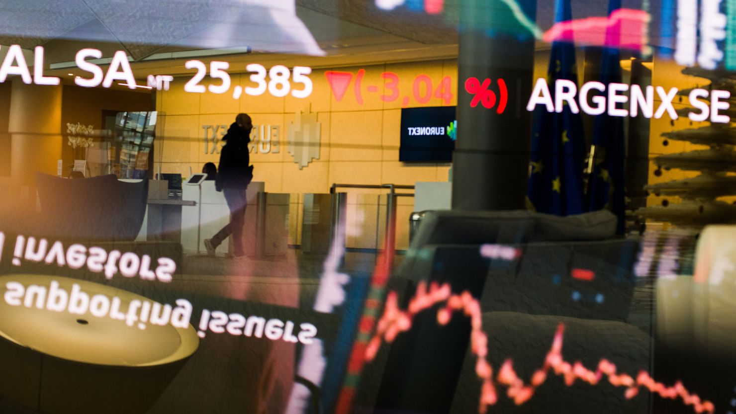 Stock prices displayed in the lobby of the Euronext NV stock exchange in Paris in December 2022.